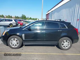 2016 Cadillac SRX Luxury Collection with VIN 3GYFNEE39GS532145, listed as a IAAI auction lot 42670496 with 193,959 mi miles and . Bid and sale history available at DreamBid. Image 14.