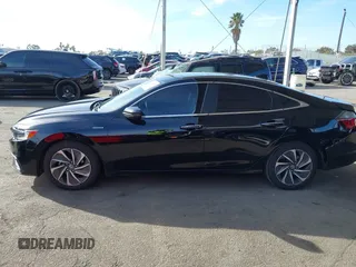 2020 Honda Insight Touring with VIN 19XZE4F91LE010778, listed as a IAAI auction lot 41430937 with 29,454 mi miles and . Bid and sale history available at carsss.com. Image 15.