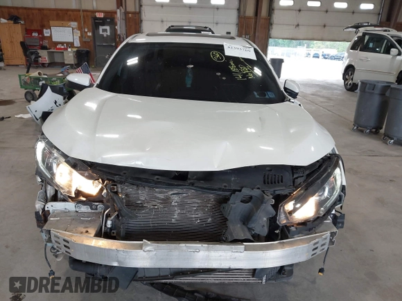 2018 Honda Civic EX-T z VIN JHMFC1F31JX009273, wystawiony jako IAAI lot #42393769 z przebiegiem 141 188 mil mil oraz . Historia ofert i sprzedaży dostępna na DreamBid. Obrazek 13.