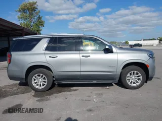 2023 Chevrolet Tahoe LT z VIN 1GNSKNKD0PR316432, wystawiony jako IAAI lot #42163185 z przebiegiem 66 293 mil mil oraz . Historia ofert i sprzedaży dostępna na DreamBid. Obrazek 13.
