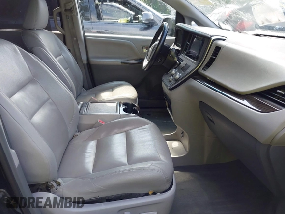 2015 Toyota Sienna XLE with VIN 5TDYK3DC8FS574645, listed as a IAAI auction lot 42528851 with 164,408 mi miles and . Bid and sale history available at DreamBid. Image 5.