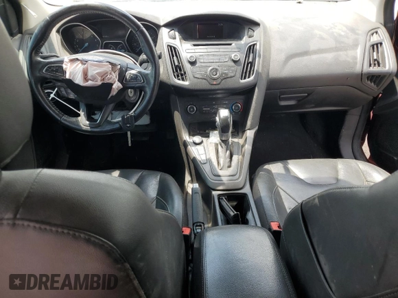 2015 Ford Focus SE with VIN 1FADP3F22FL368703, listed as a Copart auction lot 61609235 with 147,269 mi miles and Salvage title. Bid and sale history available at DreamBid. Image 8.