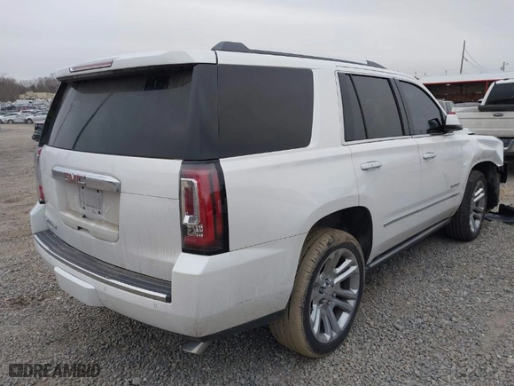 2017 GMC Yukon Denali with VIN 1GKS2CKJ3HR170889, listed as a IAAI auction lot 41384834 with 107,930 mi miles. Bid and sale history available at carsss.com. Image 4.