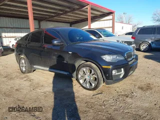 2014 BMW X6 xDrive35i with VIN 5UXFG2C59E0H11200, listed as a IAAI auction lot 41151158 with 140,478 mi miles. Bid and sale history available at carsss.com. Image 1.
