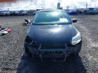 2014 Ford Focus S with VIN 1FADP3E29EL176811, listed as a IAAI auction lot 41808719 with 84,600 mi miles. Bid and sale history available at carsss.com. Image 13.