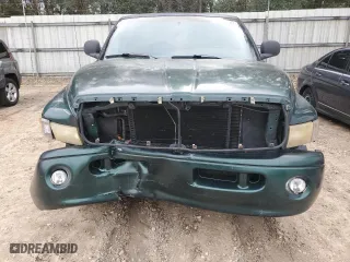 1999 Dodge Ram 1500 with VIN 3B7HC13Y6XG163338, listed as a Copart auction lot 67640594 with 207,847 mi miles and Salvage Title. Bid and sale history available at carsss.com. Image 5.