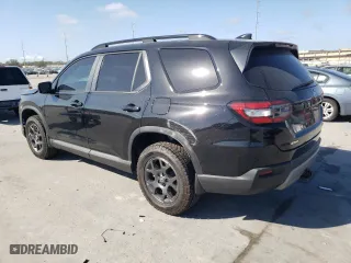 2023 Honda Pilot TrailSport with VIN 5FNYG1H66PB058087, listed as a Copart auction lot 84754824 with 26,278 mi miles and Salvage Title. Bid and sale history available at carsss.com. Image 2.