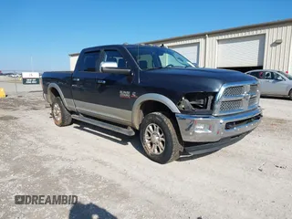 2016 Ram 2500 Laramie with VIN 3C6UR5FL3GG124072, listed as a IAAI auction lot 41305989 with 151,283 mi miles. Bid and sale history available at carsss.com. Image 1.
