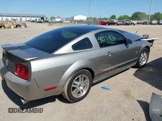 2009 Ford Mustang with VIN 1ZVHT80N295128872, listed as a IAAI auction lot 42221830 with 112,294 mi miles and . Bid and sale history available at DreamBid. Image 4.