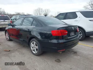 2012 Volkswagen Jetta TDI w/Premium with VIN 3VWLL7AJ9CM367840, listed as a IAAI auction lot 41868444 with 176,486 mi miles and . Bid and sale history available at DreamBid. Image 3.