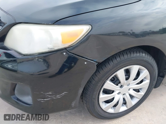 2013 Toyota Corolla L with VIN 5YFBU4EE9DP148748, listed as a IAAI auction lot 40919169 with 102,394 mi miles and . Bid and sale history available at DreamBid. Image 21.