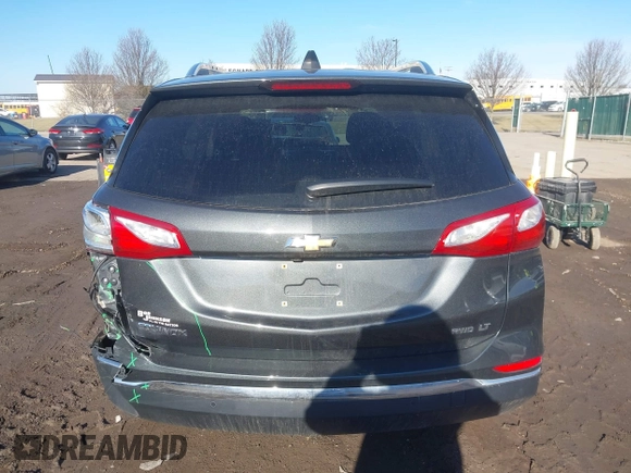 2018 Chevrolet Equinox LT z VIN 2GNAXSEV2J6122861, wystawiony jako IAAI lot #41741471 z przebiegiem 121 123 mil mil oraz . Historia ofert i sprzedaży dostępna na DreamBid. Obrazek 16.