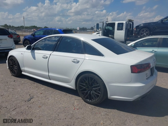 2016 Audi A6 3.0T Premium Plus with VIN WAUFGAFC9GN003664, listed as a IAAI auction lot 41890962 with 100,485 mi miles. Bid and sale history available at carsss.com. Image 3.