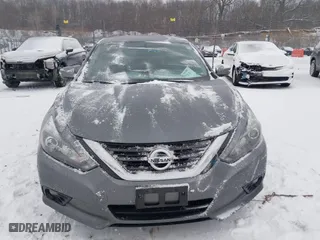 2018 Nissan Altima 2.5 SV with VIN 1N4AL3AP0JC136949, listed as a IAAI auction lot 41572923 with 69,000 mi miles. Bid and sale history available at carsss.com. Image 12.