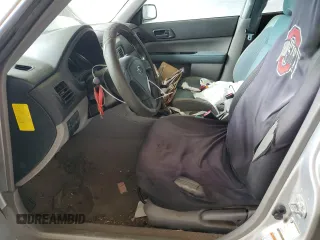 2005 Subaru Forester X с VIN JF1SG63695H739129, выставлен на аукционе Copart как лот 52977605 с пробегом 124 368 миль миль и Списание • Salvage title. История ставок и продаж доступна на DreamBid. Изображение 7.