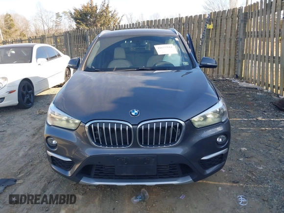 2018 BMW X1 xDrive28i with VIN WBXHT3C32J5L31896, listed as a IAAI auction lot 41675944 with 47,190 mi miles. Bid and sale history available at carsss.com. Image 12.