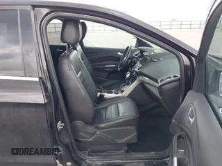 2013 Ford Escape SEL z VIN 1FMCU9H90DUC34965, wystawiony jako IAAI lot #42361165 z przebiegiem 177 387 mil mil oraz . Historia ofert i sprzedaży dostępna na DreamBid. Obrazek 5.