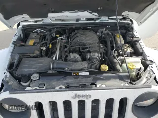 2015 Jeep Wrangler Unlimited Sahara with VIN 1C4BJWEG7FL768712, listed as a Copart auction lot 49963335 with 100,053 mi miles and Salvage Title. Bid and sale history available at carsss.com. Image 12.