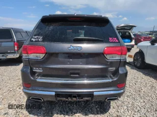2014 Jeep Grand Cherokee Summit with VIN 1C4RJFJM8EC395169, listed as a Copart auction lot 60637265 with 116,575 mi miles and Salvage title. Bid and sale history available at DreamBid. Image 6.