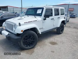 2015 Jeep Wrangler Unlimited Rubicon z VIN 1C4BJWFG1FL544883, wystawiony jako IAAI lot #42838891 z przebiegiem 87 801 mil mil oraz . Historia ofert i sprzedaży dostępna na DreamBid. Obrazek 2.