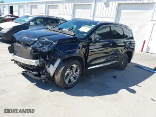 2021 Hyundai Santa Fe SEL with VIN 5NMS24AJ9MH331876, listed as a IAAI auction lot 41821775 with 56,756 mi miles. Bid and sale history available at carsss.com. Image 2.