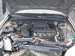 2003 Honda Civic LX with VIN 2HGES16553H620059, listed as a IAAI auction lot 41967662 with 119,918 mi miles and . Bid and sale history available at carsss.com. Image 10.