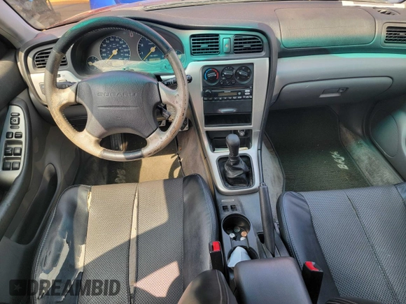 2003 Subaru Baja with VIN 4S4BT61C736109032, listed as a Copart auction lot 56075085 with 178,863 mi miles and Salvage Title. Bid and sale history available at DreamBid. Image 9.