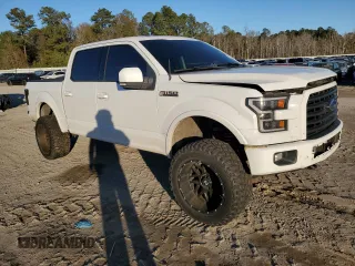 2015 Ford F-150 XLT with VIN 1FTEW1EP9FFC91698, listed as a Copart auction lot 87816535 with 127,459 mi miles and Salvage Title. Bid and sale history available at DreamBid. Image 4.