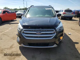 2017 Ford Escape SE z VIN 1FMCU0GD5HUD52467, wystawiony jako Copart lot #70616944 z przebiegiem 115 876 mil mil oraz Szkoda całkowita • Salvage title. Historia ofert i sprzedaży dostępna na DreamBid. Obrazek 5.
