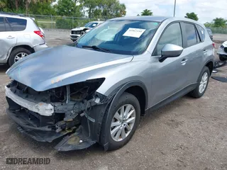 2014 Mazda CX-5 Touring with VIN JM3KE2CY4E0357445, listed as a IAAI auction lot 41967334 with 115,535 mi miles. Bid and sale history available at carsss.com. Image 18.