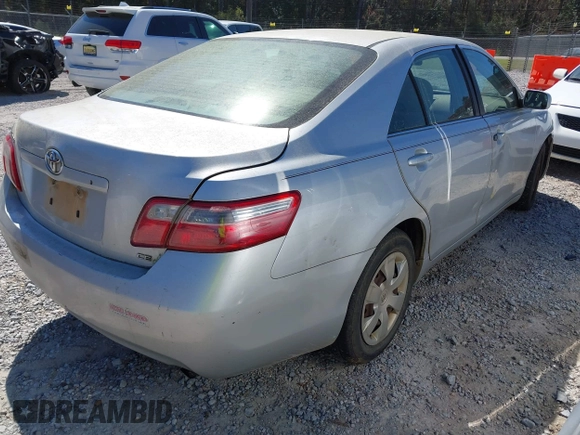 2007 Toyota Camry CE with VIN 4T1BE46K57U643632, listed as a IAAI auction lot 41851036 with 300,010 mi miles. Bid and sale history available at carsss.com. Image 4.