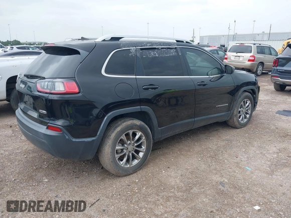 2019 Jeep Cherokee Latitude Plus with VIN 1C4PJLLB4KD176071, listed as a IAAI auction lot 42638016 with 99,401 mi miles and . Bid and sale history available at DreamBid. Image 4.