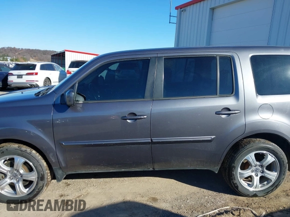 2015 Honda Pilot EX-L with VIN 5FNYF4H57FB063115, listed as a IAAI auction lot 41248234 with 187,752 mi miles and . Bid and sale history available at carsss.com. Image 14.