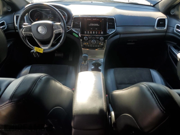 2020 Jeep Grand Cherokee Laredo E with VIN 1C4RJEAG8LC391401, listed as a Copart auction lot 80630874 with 122,083 mi miles and Salvage title. Bid and sale history available at DreamBid. Image 8.