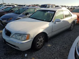 2000 Acura RL with VIN JH4KA9654YC000685, listed as a Copart auction lot 73986054 with 0 mi miles and Salvage Title. Bid and sale history available at carsss.com. Image 1.
