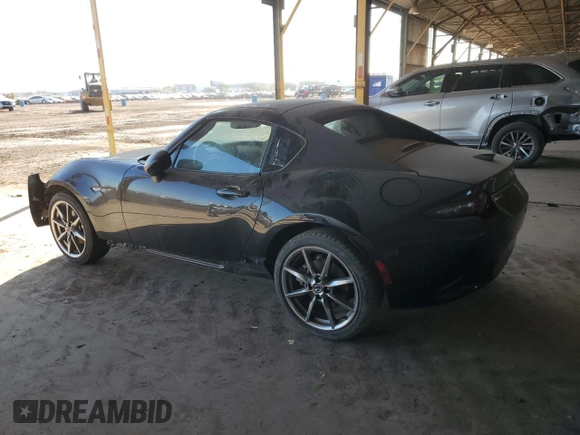 2023 Mazda MX-5 Miata Grand Touring z VIN JM1NDAM71P0551782, wystawiony jako Copart lot #88795725 z przebiegiem 22 626 mil mil oraz Nie do naprawy • Non repairable. Historia ofert i sprzedaży dostępna na DreamBid. Obrazek 2.