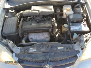 2006 Suzuki Forenza Premium z VIN KL5JJ56Z36K268290, wystawiony jako Copart lot #88509495 z przebiegiem 199 303 mil mil oraz Szkody całkowita. Historia ofert i sprzedaży dostępna na DreamBid. Obrazek 13.