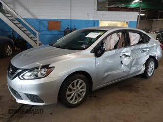 2019 Nissan Sentra SV z VIN 3N1AB7AP5KY453853, wystawiony jako IAAI lot #42187825 z przebiegiem 64 495 mil mil oraz . Historia ofert i sprzedaży dostępna na DreamBid. Obrazek 2.