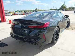 2020 BMW M8 with VIN WBSAE0C01LCD71085, listed as a IAAI auction lot 41432091 with 14,032 mi miles. Bid and sale history available at carsss.com. Image 4.