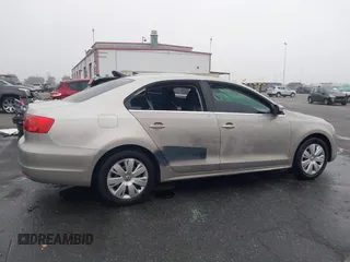 2013 Volkswagen Jetta SE z VIN 3VWDP7AJ4DM265033, wystawiony jako IAAI lot #41029651 z przebiegiem 126 879 mil mil oraz . Historia ofert i sprzedaży dostępna na DreamBid. Obrazek 14.
