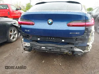 2023 BMW X4 xDrive30i z VIN 5UX33DT01P9P86340, wystawiony jako IAAI lot #42113558 z przebiegiem 27 226 mil mil oraz . Historia ofert i sprzedaży dostępna na DreamBid. Obrazek 6.