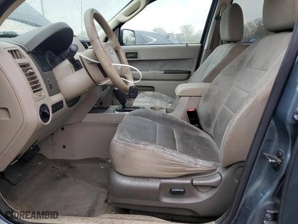 2010 Ford Escape XLT with VIN 1FMCU0D74AKD01784, listed as a Copart auction lot 52857725 with 119,448 mi miles and Salvage Title. Bid and sale history available at carsss.com. Image 7.