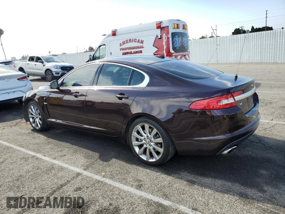 2011 Jaguar XF Premium with VIN SAJWA0GB1BLS08325, listed as a Copart auction lot 61190335 with 61,656 mi miles and Salvage title. Bid and sale history available at DreamBid. Image 2.