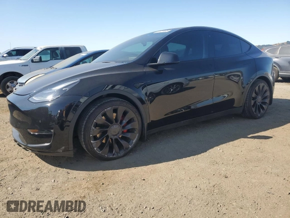 2022 Tesla Model Y Performance with VIN 7SAYGDEF1NF486218, listed as a Copart auction lot 63127435 with 99,302 mi miles and Salvage title. Bid and sale history available at DreamBid. Image 1.