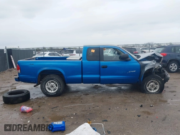 1998 Dodge Dakota SLT z VIN 1B7GG22YXWS683170, wystawiony jako IAAI lot #41903787 z przebiegiem Nie podano mil oraz . Historia ofert i sprzedaży dostępna na DreamBid. Obrazek 13.