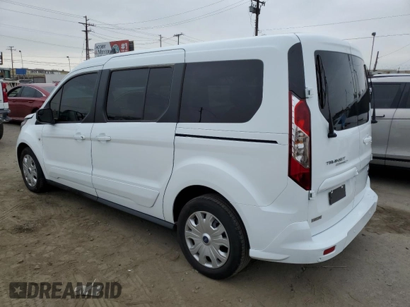 2022 Ford Transit Connect XLT with VIN NM0GS9F28N1514084, listed as a Copart auction lot 62392655 with 43,395 mi miles and Salvage title. Bid and sale history available at DreamBid. Image 2.