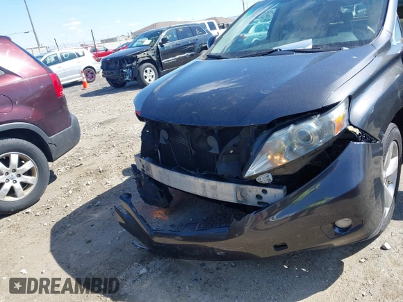 2010 Lexus RX 350 with VIN 2T2BK1BA5AC025283, listed as a IAAI auction lot 41988850 with 217,419 mi miles. Bid and sale history available at carsss.com. Image 6.