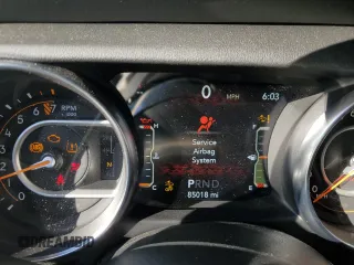 2020 Jeep Wrangler Unlimited Sahara with VIN 1C4HJXEG5LW150427, listed as a Copart auction lot 82891084 with 85,018 mi miles and Salvage Title. Bid and sale history available at carsss.com. Image 9.
