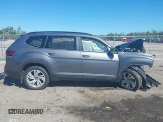 2021 Volkswagen Atlas SE z VIN 1V2WR2CA3MC602149, wystawiony jako IAAI lot #41845288 z przebiegiem 59 941 mil mil oraz . Historia ofert i sprzedaży dostępna na DreamBid. Obrazek 12.