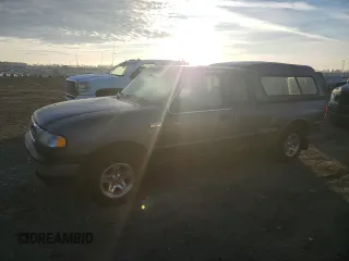 1999 Mazda B-Series 2WD Truck SE with VIN 4F4YR16V7XTM09808, listed as a Copart auction lot 87118994 with 117,698 mi miles and Clean Title. Bid and sale history available at carsss.com. Image 1.